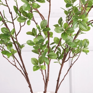 Artificial Milan leaf branch with green oval leaves and brown textured stem for home decor