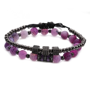 Detail of double-layer purple cracked agate bead bracelet with black zircon cubes