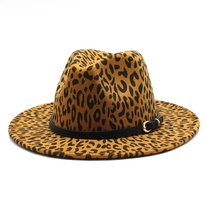Detail view of leopard print fedora hat featuring black leather band and gold buckle