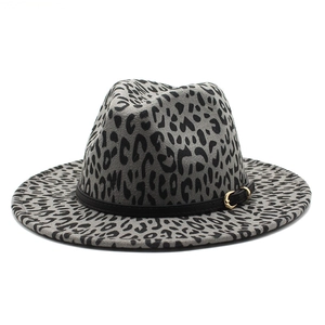Gray leopard print wool fedora hat with a black leather buckle strap on white background