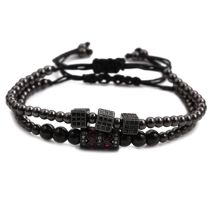 Stackable beaded bracelet set with black micro-pave cubes and zircon-inlaid cylinders