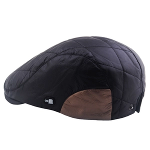 Quilted black newsboy cap for men with brown panels and adjustable metal buckle