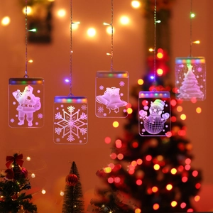 3D Christmas LED window lights featuring Santa and snowflakes in warm white glow