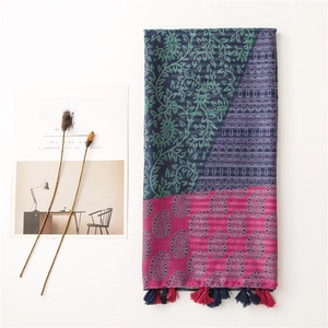 Ethnic paisley and floral print cotton linen scarf shawl with boho tassel detailing