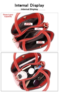 Internal display of red tote bag showing three-layer layout with large storage capacity