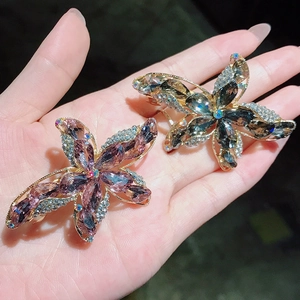 Elegant butterfly hair clips with pink and purple K9 crystals and rhinestones in gold setting