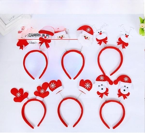 Close-up of 6-piece Christmas headbands set with Santa, reindeer and snowman designs