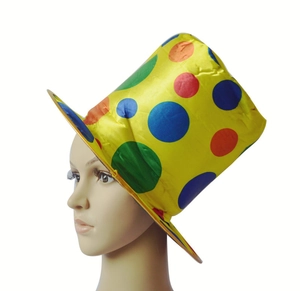 Close-up of a colorful polka dot clown top hat made of glossy fabric for parties