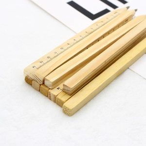 Detail view of square eco-friendly wooden pencils with printed 14cm measurement scale