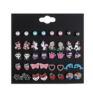 20 pairs of blue animal stud earrings set with unicorn fox and pearl on black display card