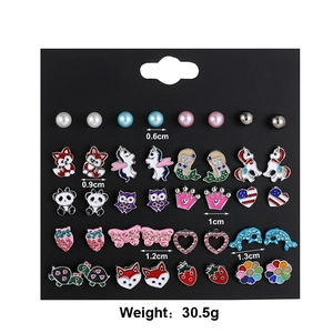 Detail view of 20 pairs of blue animal stud earrings with sizes from 0.6cm to 1.3cm