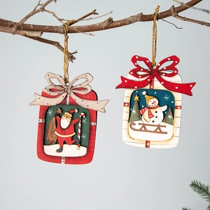 Christmas wooden ornaments featuring Santa Claus and snowman on tree branches