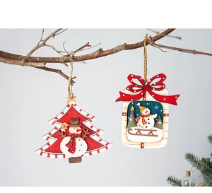 Detailed view of 3D layered wooden snowman ornaments for Christmas tree and door decor
