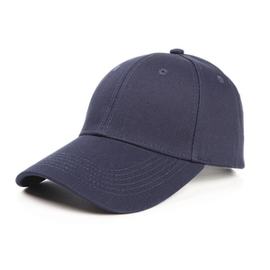 Detail of navy blue cotton twill baseball cap with six-panel design and curved brim
