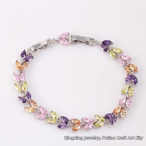 Detail of wheat ear bracelet with marquise-cut colorful zircons and silver plating