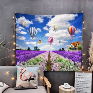 Cozy room wall decor showing a large lavender field tapestry with hot air balloons