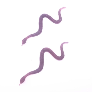 Detailed close-up of two purple rubber toy snakes with realistic scale textures and curves