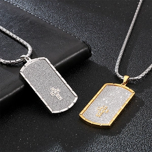 Men's stainless steel dog tag necklace with a cross pendant in gold and silver finish
