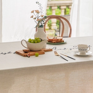 Minimalist beige linen tablecloth with black letter printing and tassels for home decor