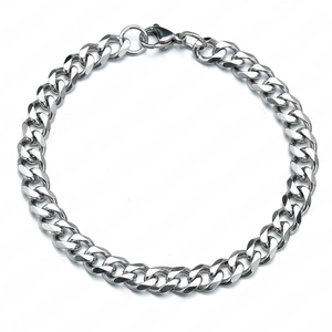 Close-up of silver Cuban link chain bracelet with lobster clasp and polished finish