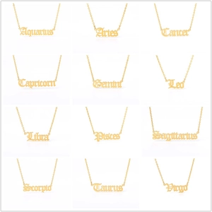 Golden 12 zodiac constellation necklaces with Gothic font letters on white background