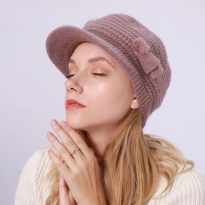 Damen Strick-Baskenmütze in Rosa mit eleganter Schleife und flauschigem Bommel