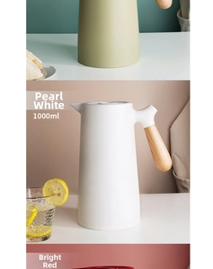 Detail of 1L Nordic thermal carafe with matte body and wood-grain handle in white