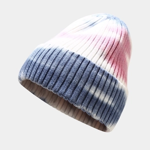 Tie-dye ribbed knit beanie in blue, pink, and white gradient for winter warmth