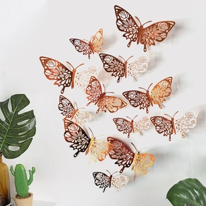 Detailed 3D hollow butterfly wall stickers with metallic gradient finish in a home setting