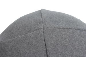 Detailed close-up of premium grey beanie with reinforced stitching and wool felt texture