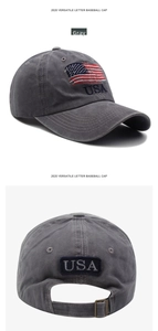 Detailed view of USA embroidery and flag on distressed grey washed cotton baseball cap