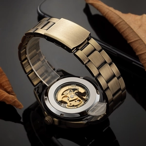 Detailed macro view of the skeleton case back showing the gold automatic movement