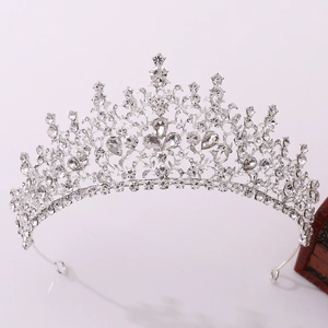 Detailed view of silver baroque crown with sparkling crystals for brides and birthdays