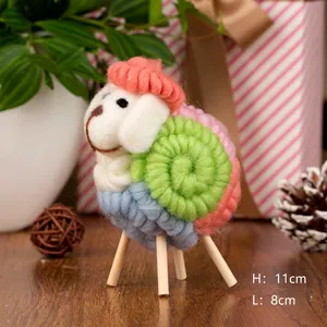 Detail view of handmade wool felt sheep ornament with size labels 11cm height and 8cm length