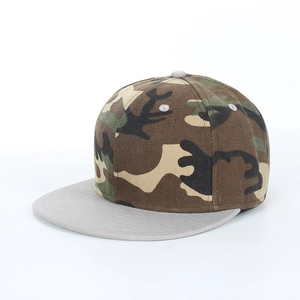 Detail of flat brim baseball cap featuring woodland camouflage and grey contrast brim