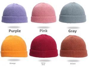 Selection of retro ribbed knit beanie hats in purple, pink, grey, orange, burgundy, and brown