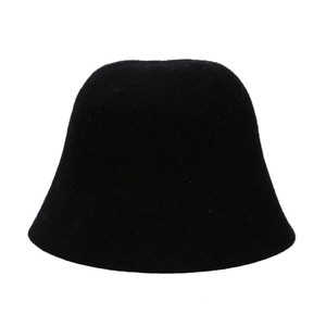 Close-up of black wool felt bucket hat showing its minimalist design and soft texture