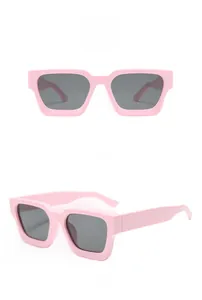 Front and 45-degree side views of pink square sunglasses with dark gray lenses