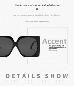 Close-up of square cat-eye sunglasses with reinforced metal hinges and grey lenses