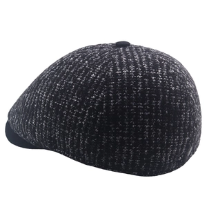 Winter knitted wool newsboy cap for men featuring classic black and grey textured knit