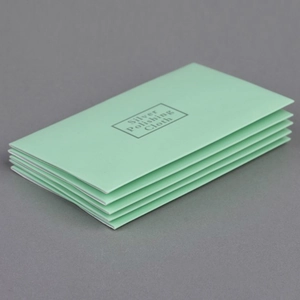 Five mint green silver polishing cloths stacked for jewelry cleaning and maintenance