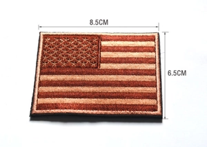 Detail view of USA flag morale patch with dimensions of 8.5cm by 6.5cm in bronze tones