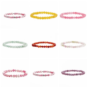 Detail view showing 8mm tiger eye stone and crown bead bracelets in various vibrant colors