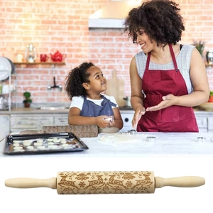 Christmas wooden rolling pin with reindeer and snowflake engraving for festive cookie baking