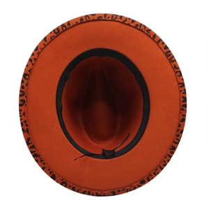 Top view of orange felt fedora showing black sweatband and leopard print underbrim