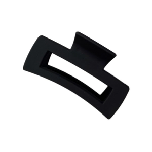 Minimalist matte black rectangular hollow hair claw clip for women on white background