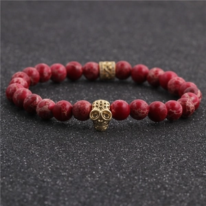 8mm Red Imperial Stone Beaded Bracelet with Golden Skull and Textured Metal Bead Accent