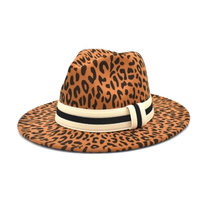 Wide-brim leopard print wool fedora hat with black and white striped ribbon band