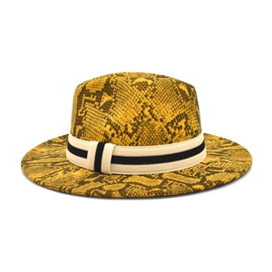 Yellow faux snake skin wool fedora hat with wide brim and white braided ribbon band
