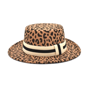 Flat top leopard print wool boater hat with striped ribbon detail on white background